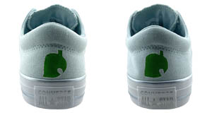 Animal Crossing: Green leaf with white border painted on back of both shoes.