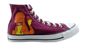 Charmander: Outside of the right shoe with a Charmander sitting and smiling painted on it.