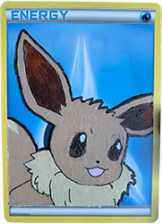A Water Energy card with Eevee pained on top.