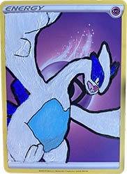 A Psychic Energy card with Lugia painted on top.