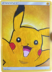 An Electric Energy card with Pikachu painted on top.
